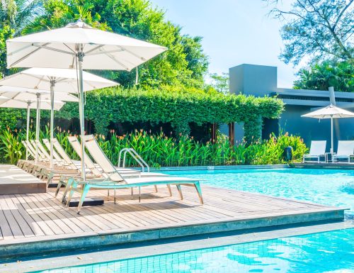 Umbrella with chair in hotel  swimming pool resort